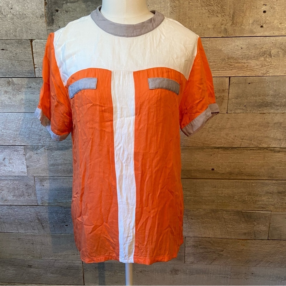 🛍️3/$30  Bayo women’s orange colourblock rear button up top in‎ size medium